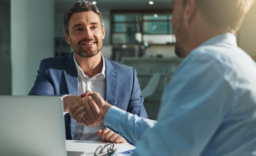 Two businessmen shaking hands